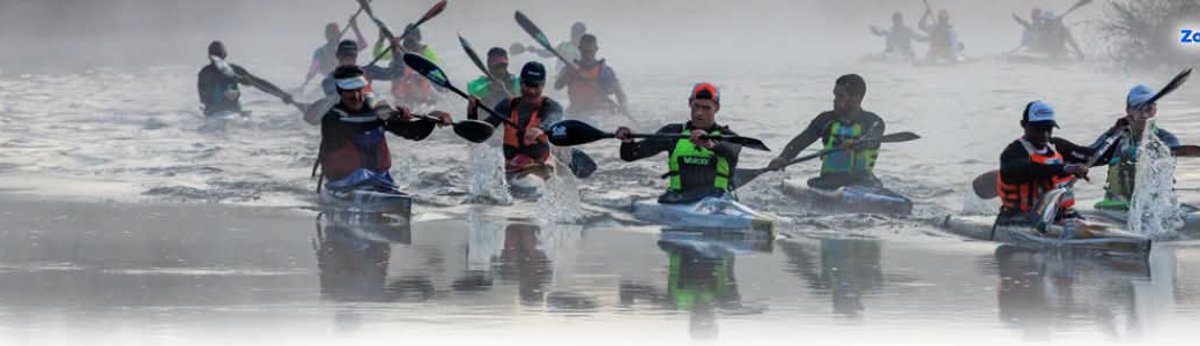 Berg River marathon paddlers in winter mist at dawn