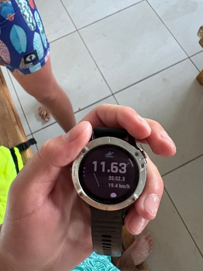 GPS watch showing 11.63km in 35:52.3 at 19.4 km/h after the record Miller's Run